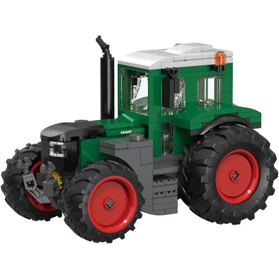 Grüner Fendt Vario 600 Traktor aus Klemmbausteinen mit weissem Kabinendach und roten Felgen
