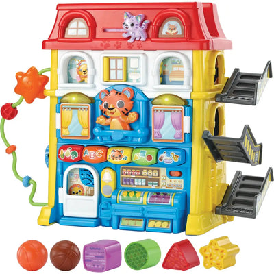 VTech Tierfreunde-Entdeckerhaus von vorn mit Tiger, Katze auf dem Dach sowie den vier Formblöcken und zwei Bällen