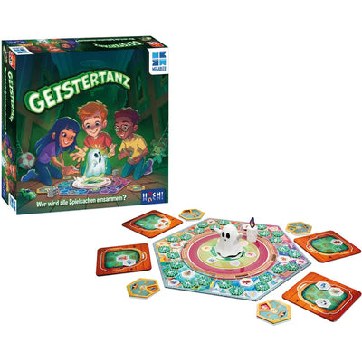 Geistertanz Schachtel mit aufgebautem Spiel: sechseckiger Spielplan, Geist, Kerze und Spielertableaus