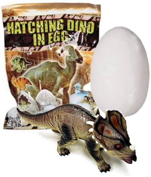 Schlüpfender Dino im Ei